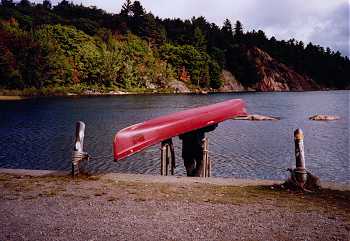 Dave putting the canoe in