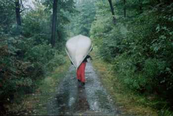 Dave portaging in the rain